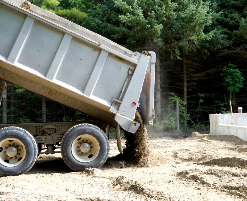 Backhoe Taking Dirt